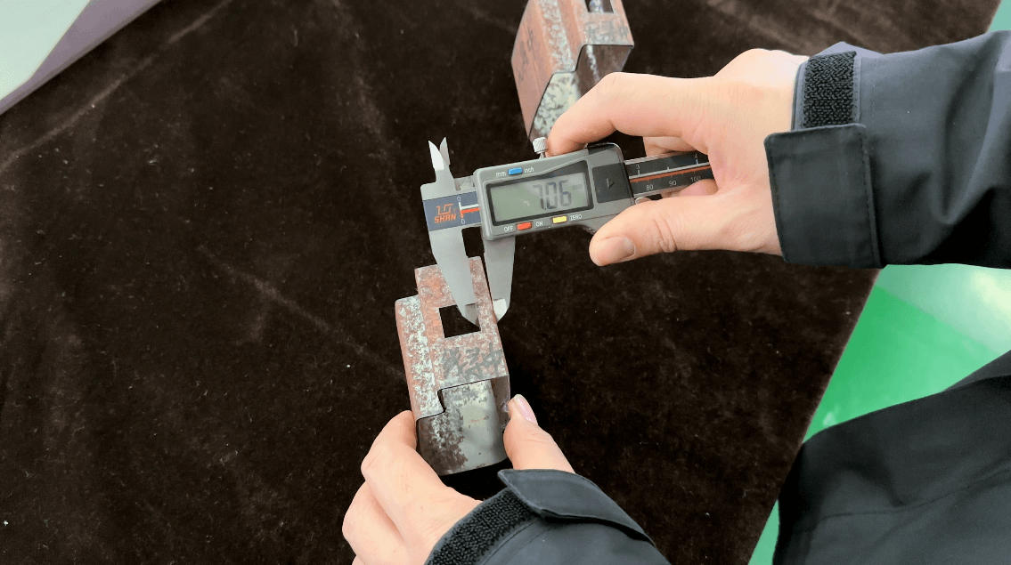 Vernier caliper measuring laser-cut channel steel