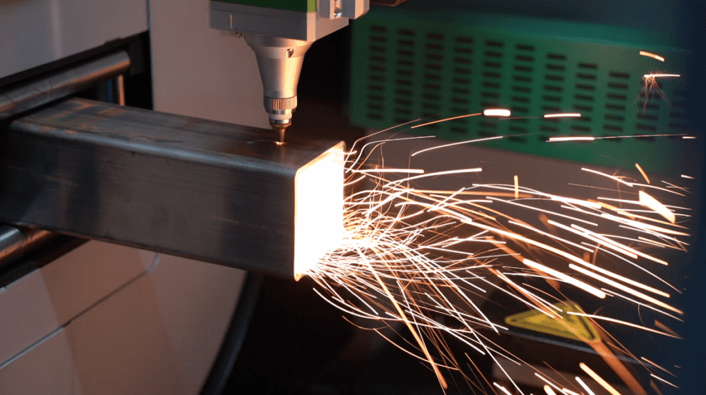 Laser cutting square tube, sparks bursting