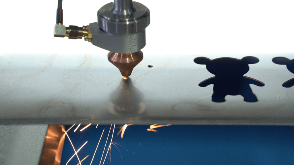 Laser cutting metal sheet