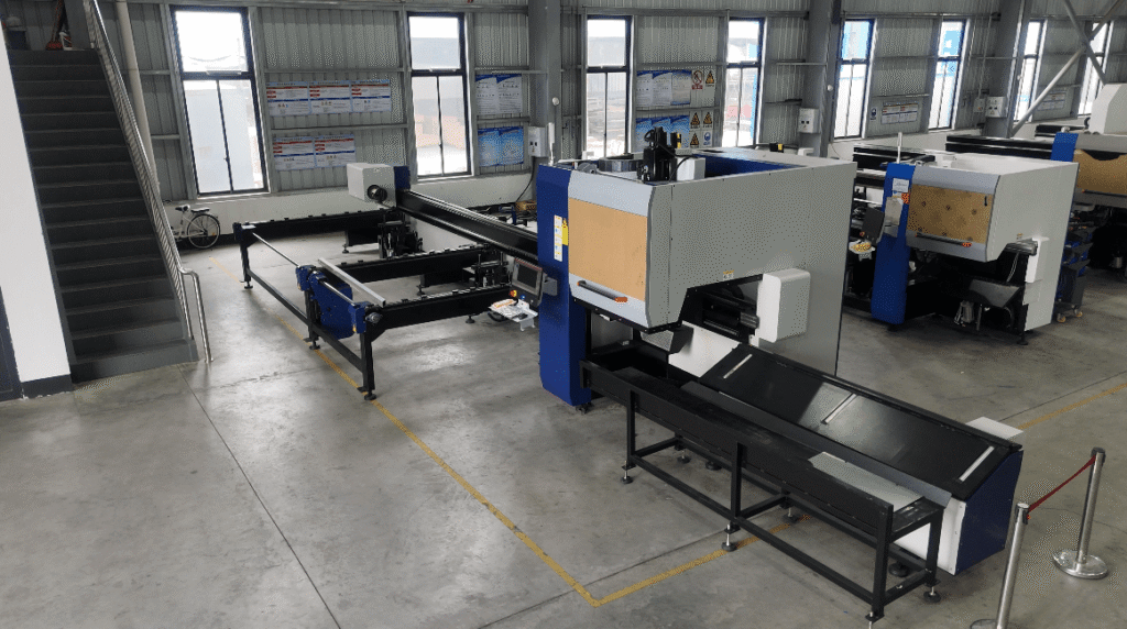 Fiber laser cutting metal tubes with high precision.