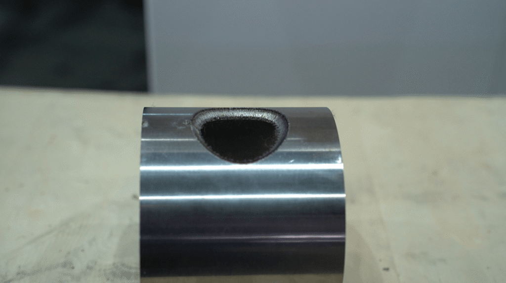 Finished laser-cut metal parts with clean, precise edges.