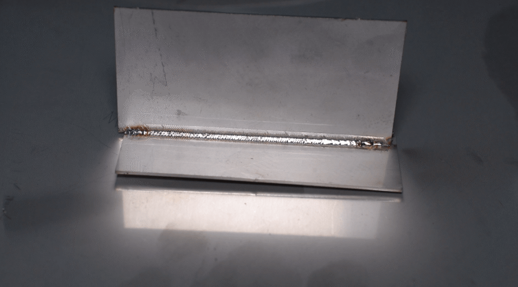 Zero-deformation weld seam on sheet metal processed by a laser welding machine.