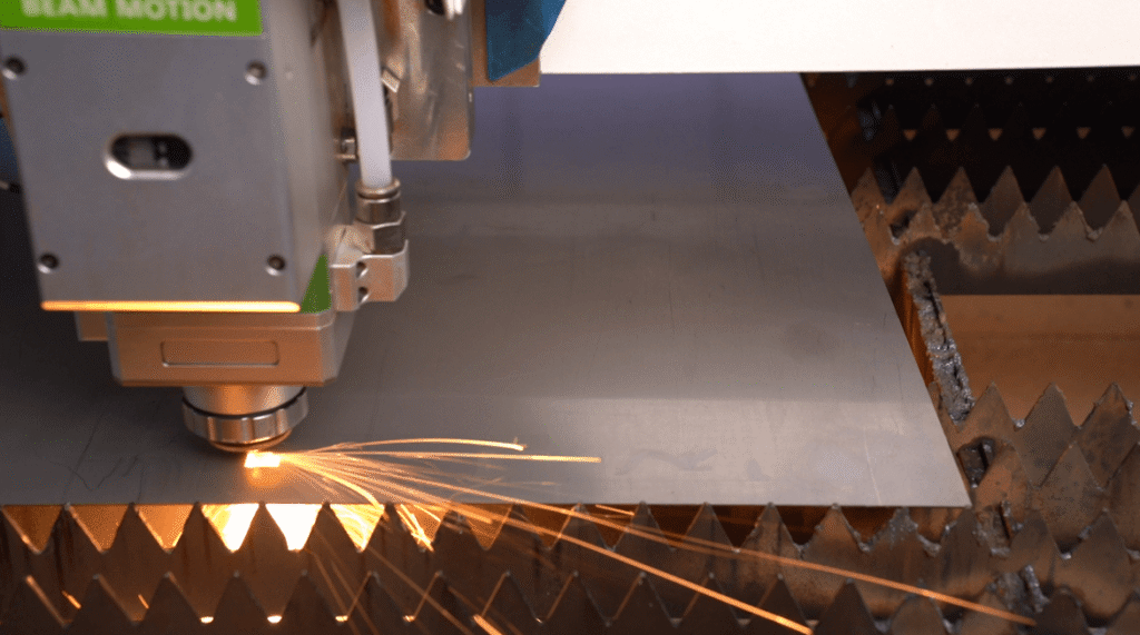 High-pressure fiber laser cutting stainless steel with sparks