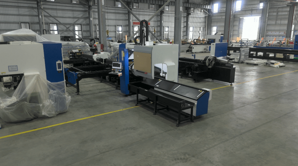 Automated heavy-duty laser pipe and plate cutting production line in workshop.