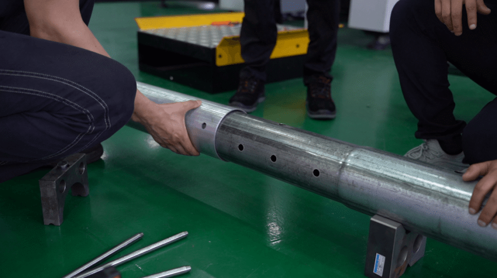 Laser tube cutting process with sparks.