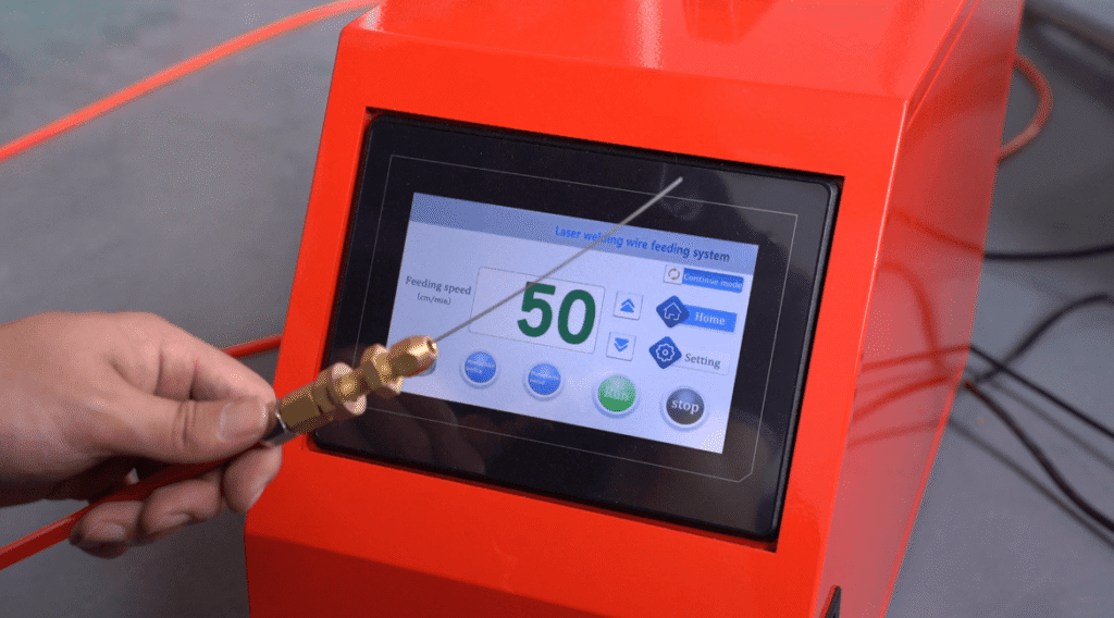 Laser welding wire feeding system touch screen displaying parameters.