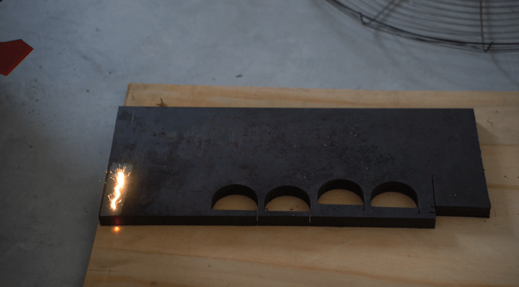 Laser cleaning perforated metal plate