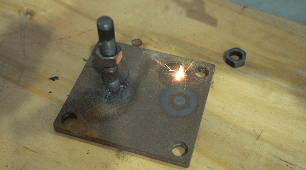 Laser cleaning rusted bolt plate