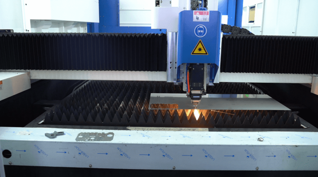 Laser tube cutter chuck and cutting head close-up