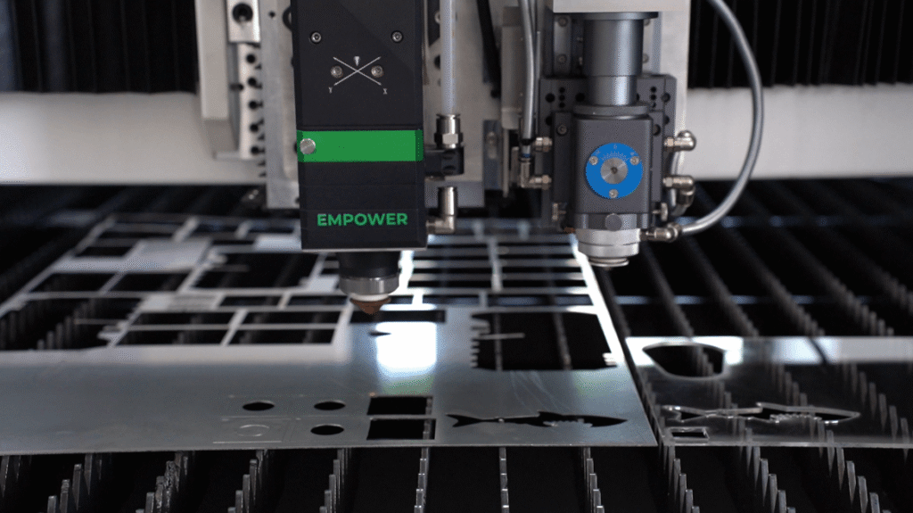 High power laser cutting stencil machine processing sheet metal.