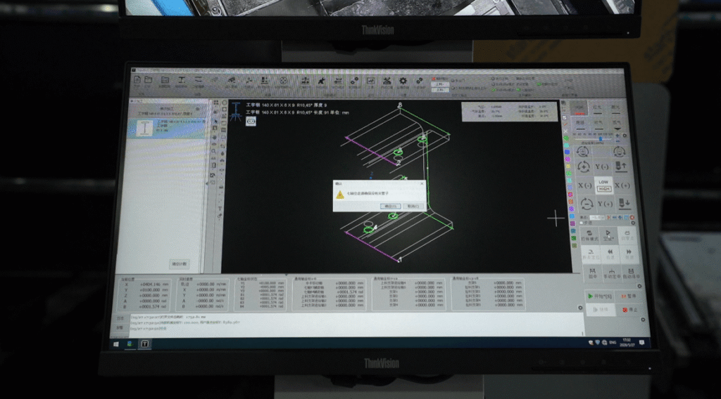 CNC laser machine monitor showing a 3D stencil design software.