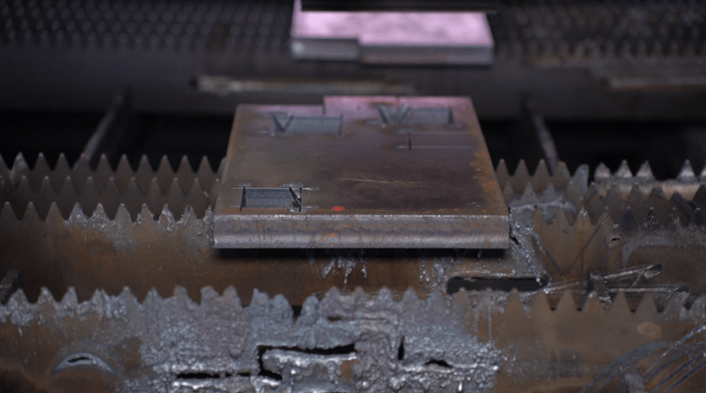 Smooth and burr-free cut edge of thick carbon steel.