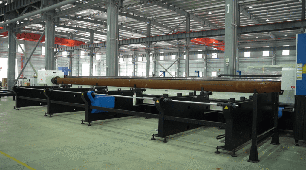 Large-diameter steel pipe on the loader rack.