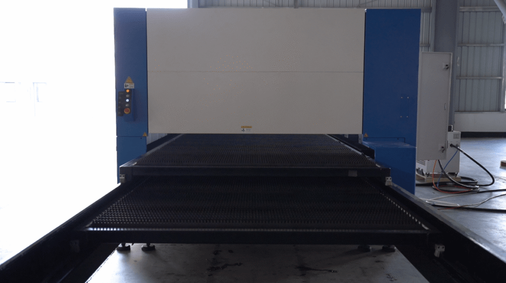 Dual-interchange tables of a fiber sheet laser cutter.