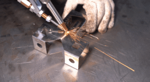Laser welding stainless steel sheet metal joints.