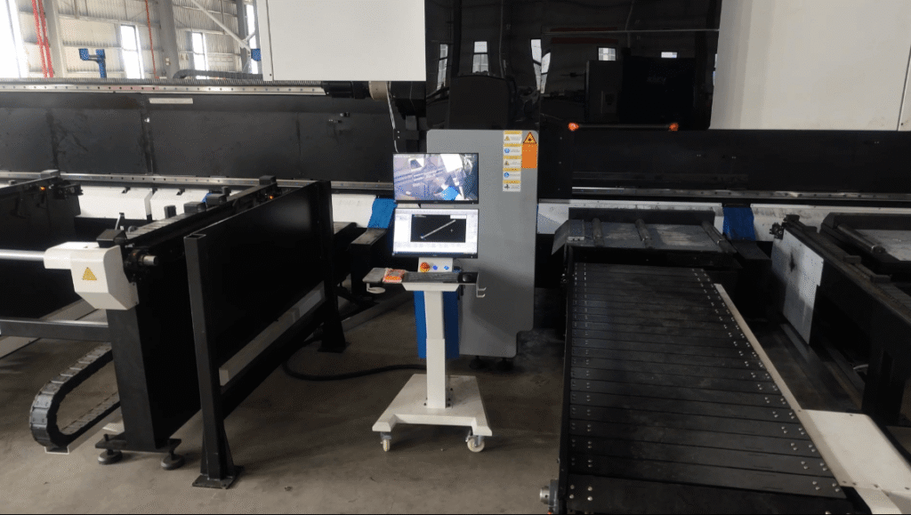 Dual-screen control station and automated conveyor.