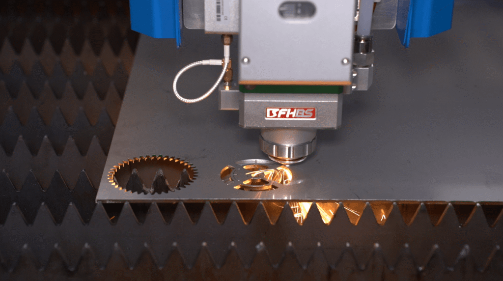 Laser head cutting metal part