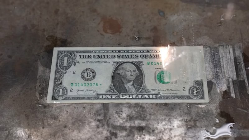 money with laser cleaning
