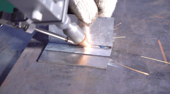 Large industrial custom laser welding machine system for manufacturing scalability.