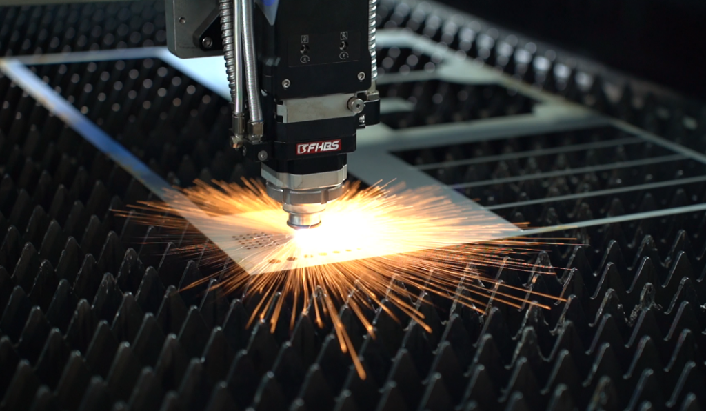 High-precision laser cutting machine working on metal plate