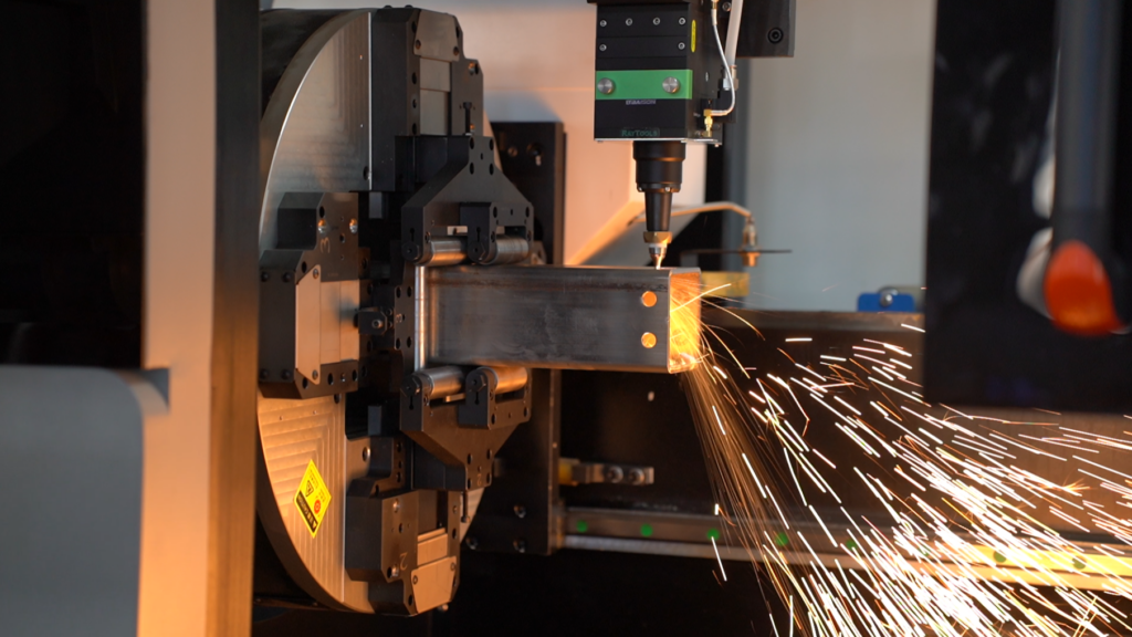 Baison K12C laser cutting square metal tube, sparks flying.