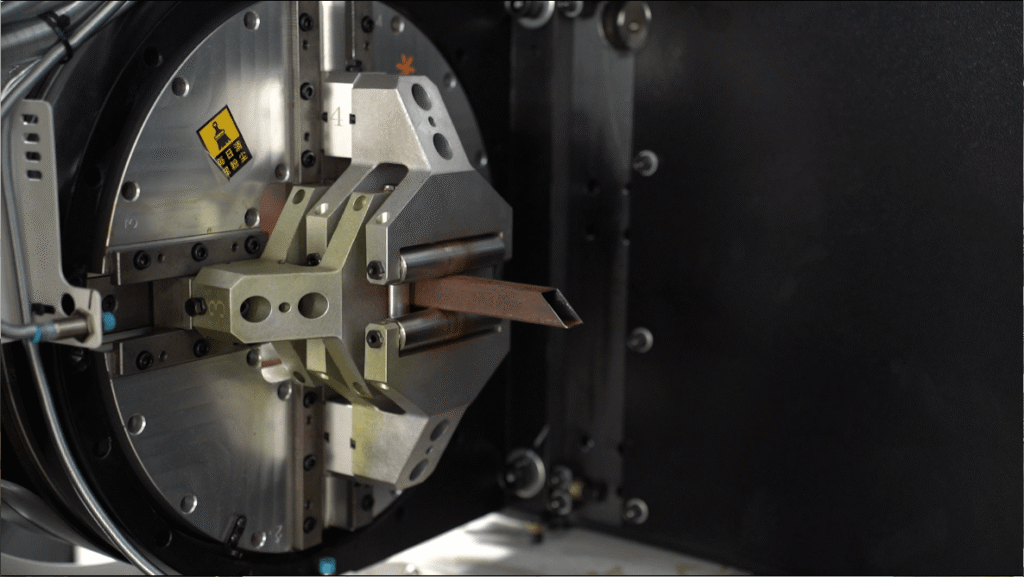 Close-up of metal pipe clamping fixture