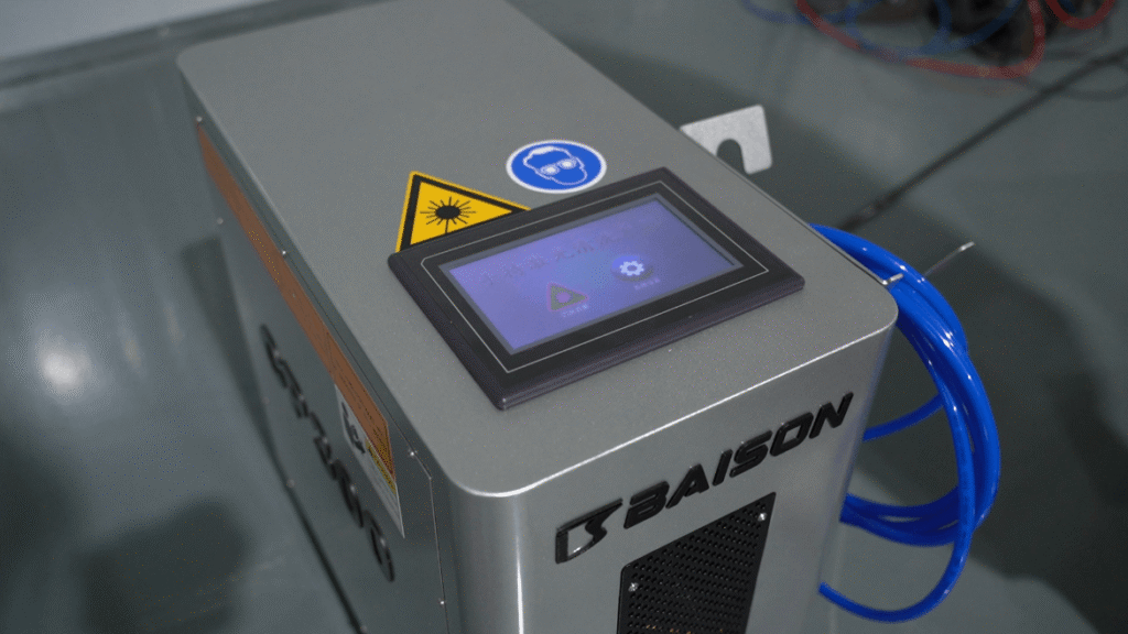 Close-up of the smart touchscreen panel on a Baison laser cleaner.