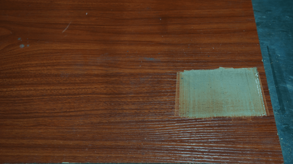 Laser cleaning effect sample on wood grain surface