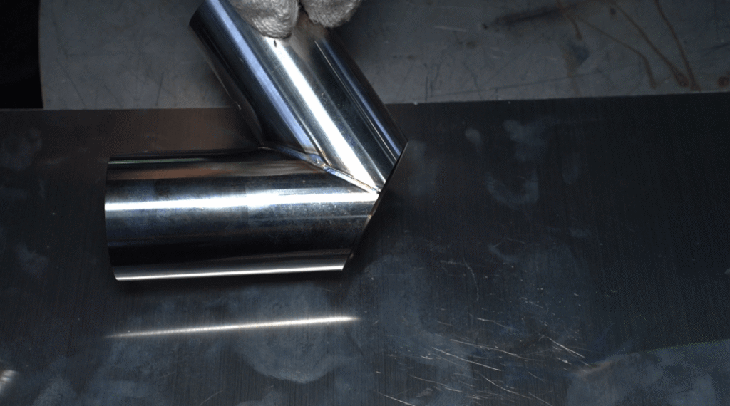 Perfectly welded stainless steel pipe joint close up