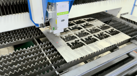 Laser cutting metal sheet