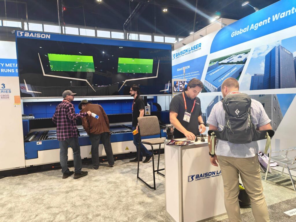 Visitors at Baison Laser IMTS booth.