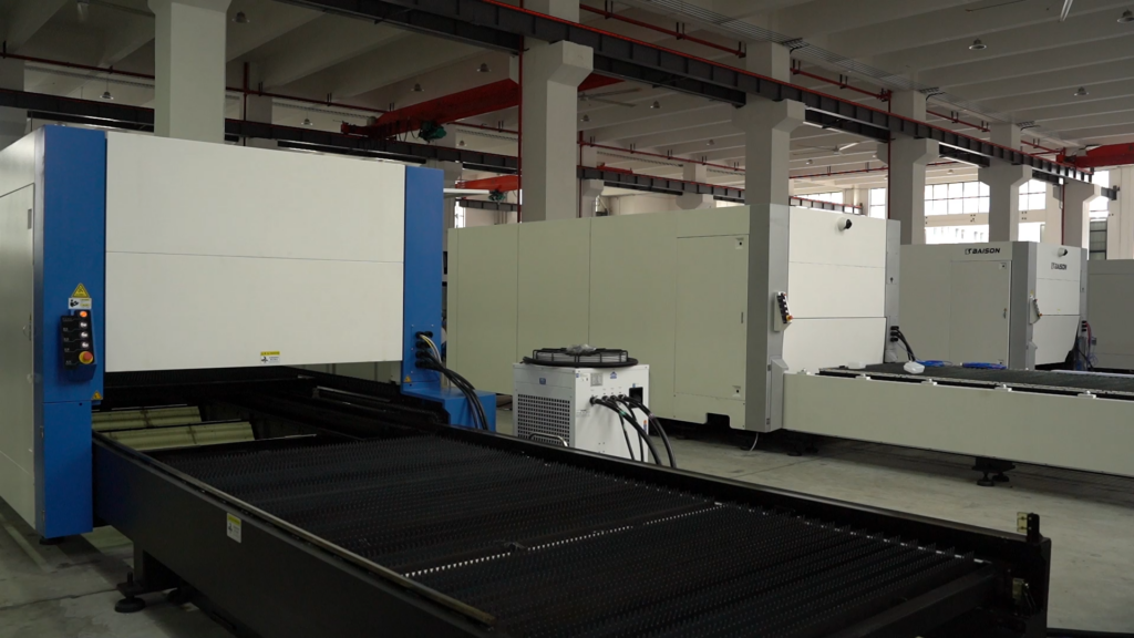 Enclosed sheet metal laser cutting machine system