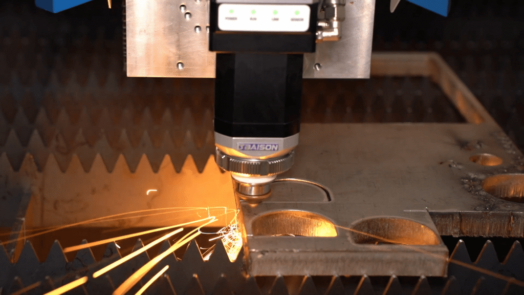 Fiber laser cutting head cutting sheet metal