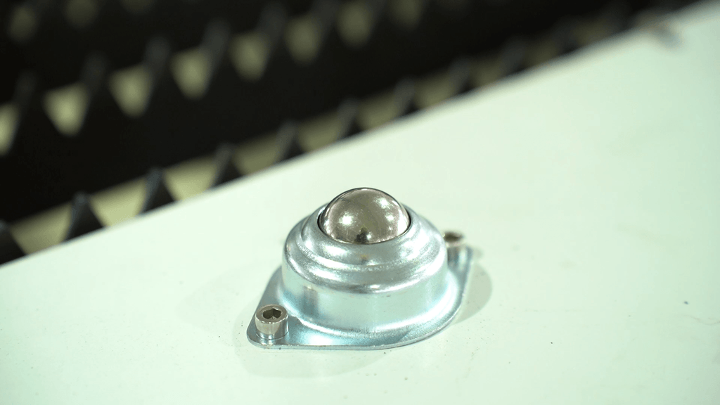 Omni-directional ball roller on Baison EC3 table for scratch-free sheet feeding