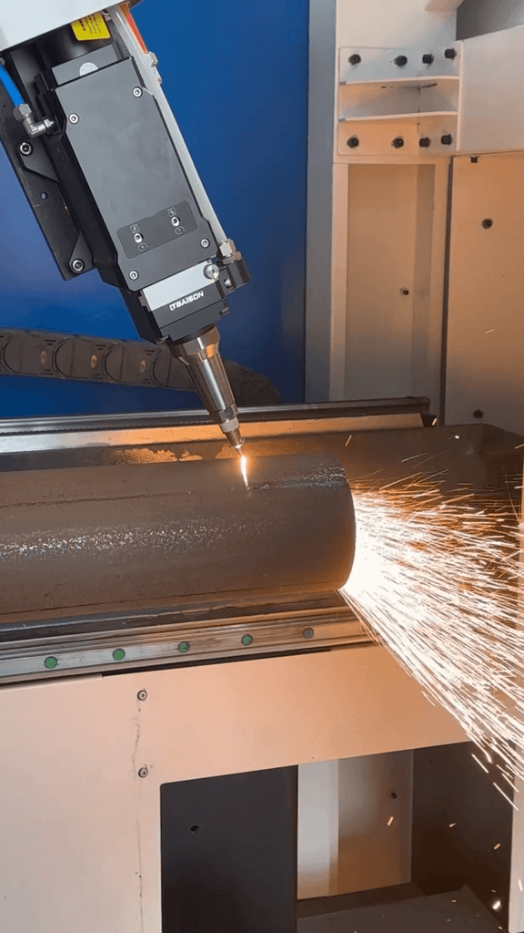Baison G24CP laser tube cutting machine performing bevel cut on round pipe.