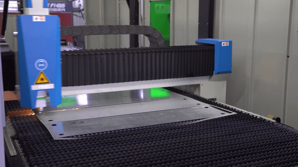BAISON SJC3 fiber laser cutting head processing metal sheets with high precision.