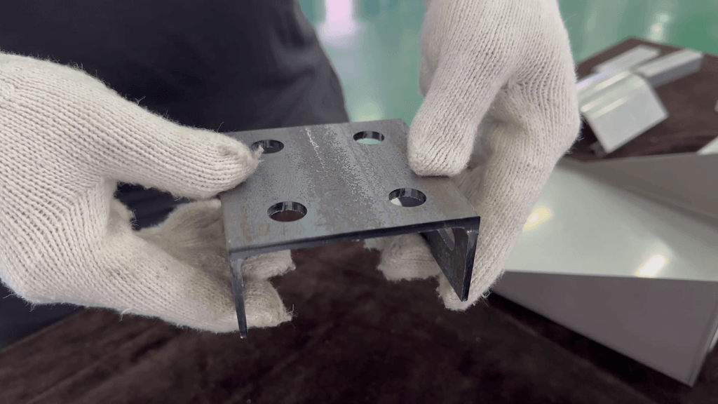 Burr-free laser cut galvanized steel C-channel bracket with clean holes