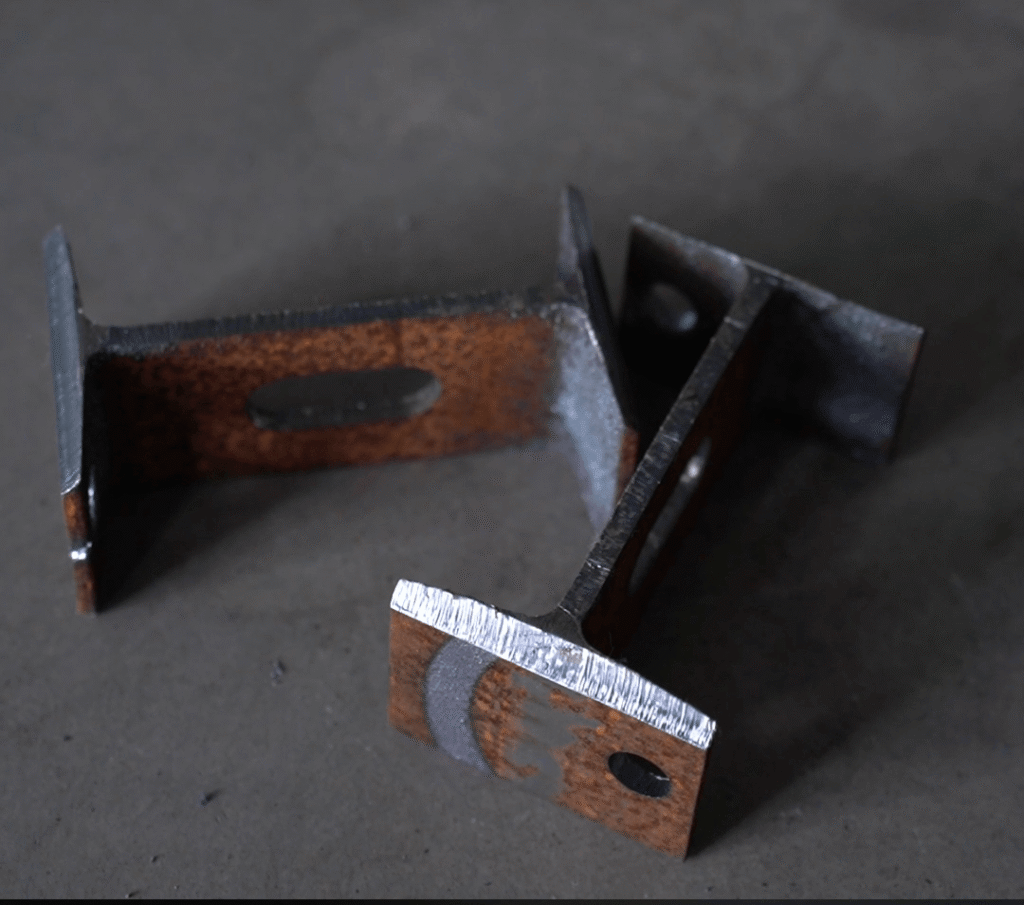 Dross-free laser cut sample of I-beam steel profile ready for welding
